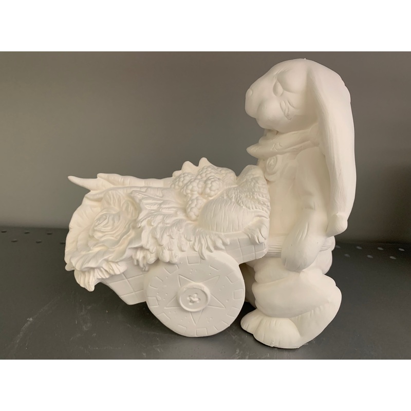 Bunny Rabbit Pushing Wheel barrel of Carrots